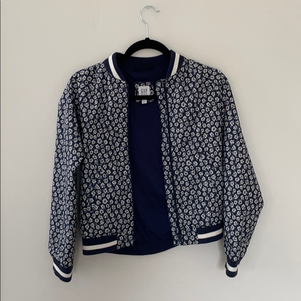 Navy and white bomber jacket.